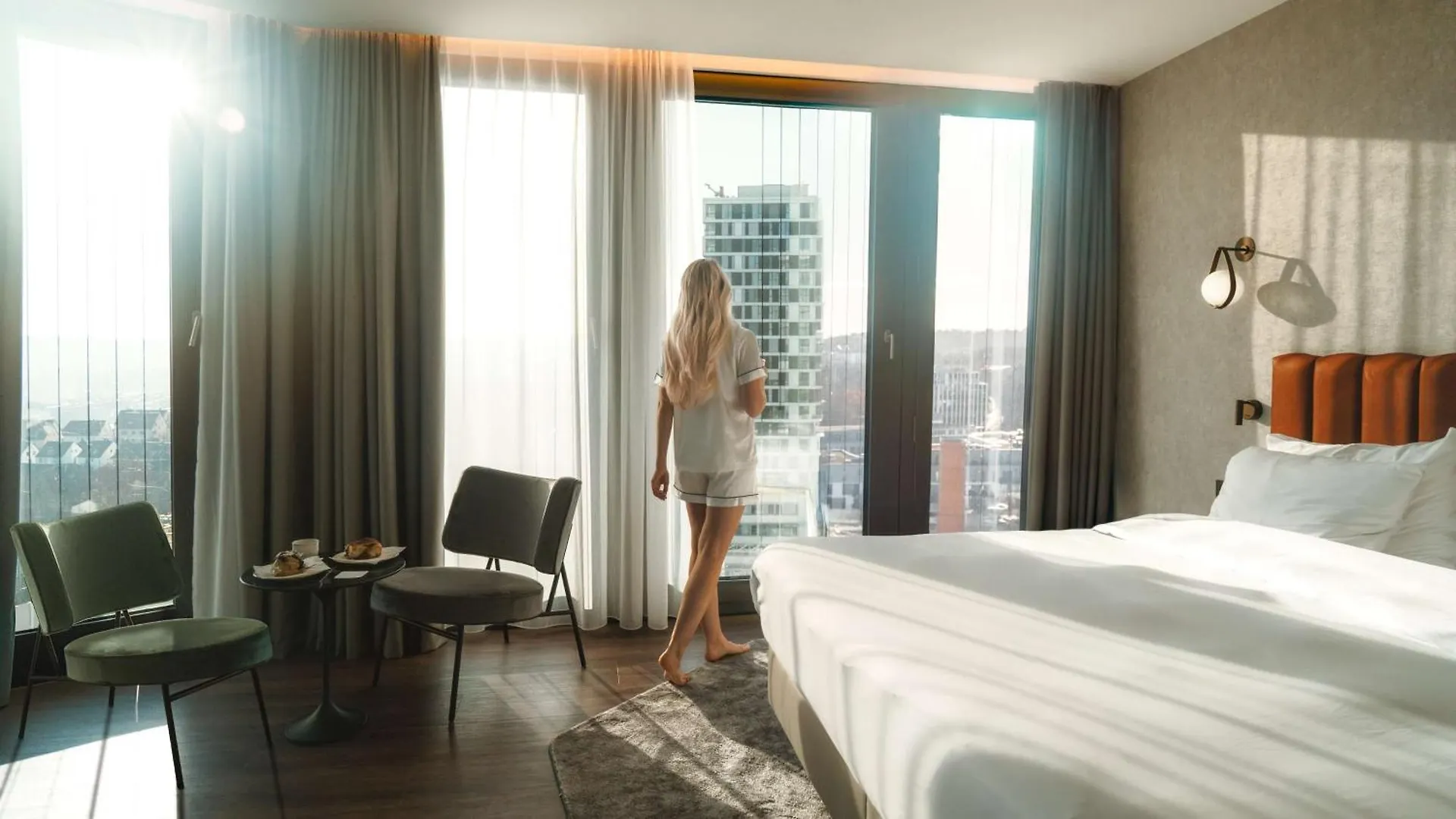 Radisson Blu Hotel At Porsche Design Tower Stoccarda 4*,  Germania